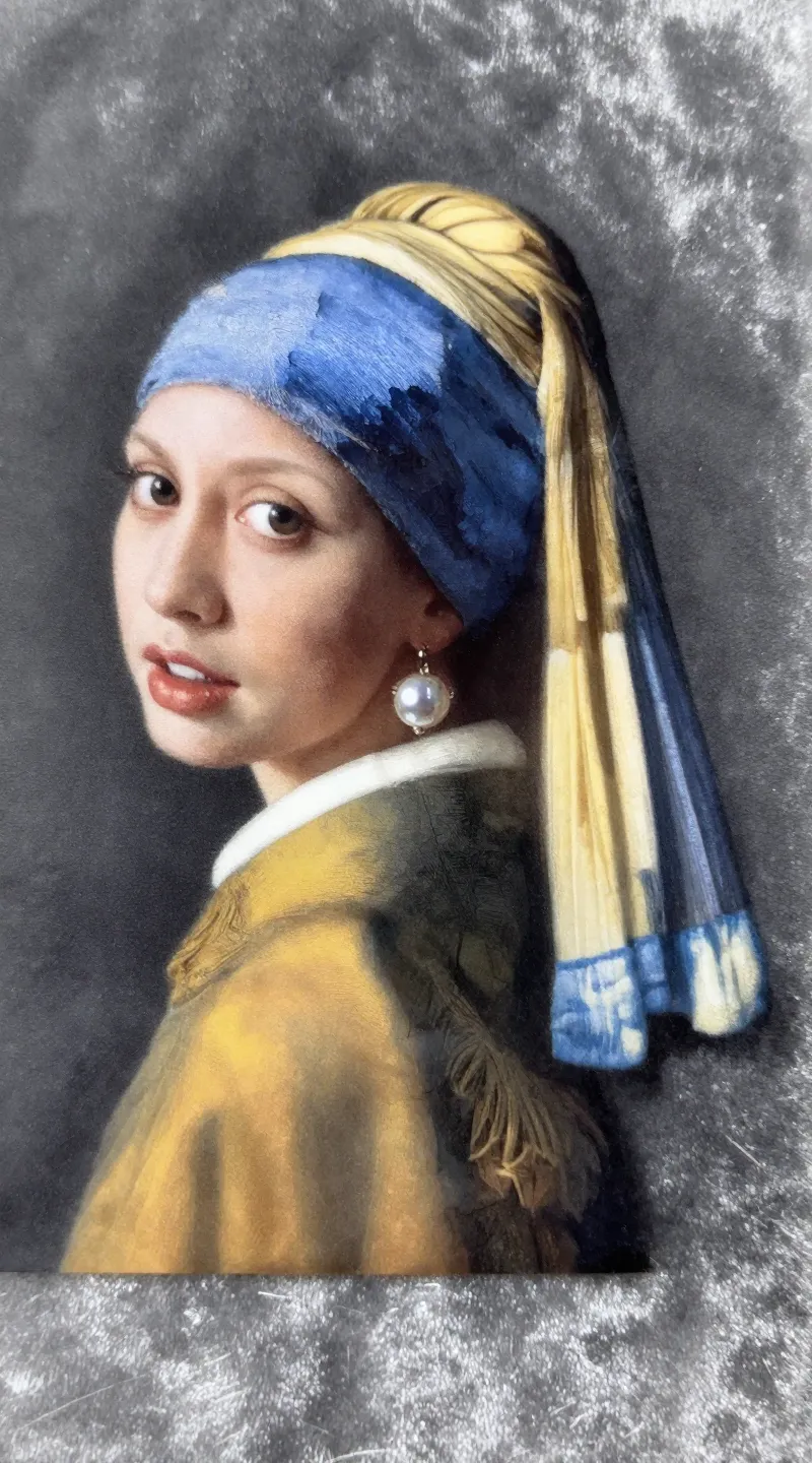 **Detailed shot of a pearl earring on velvet fabric**