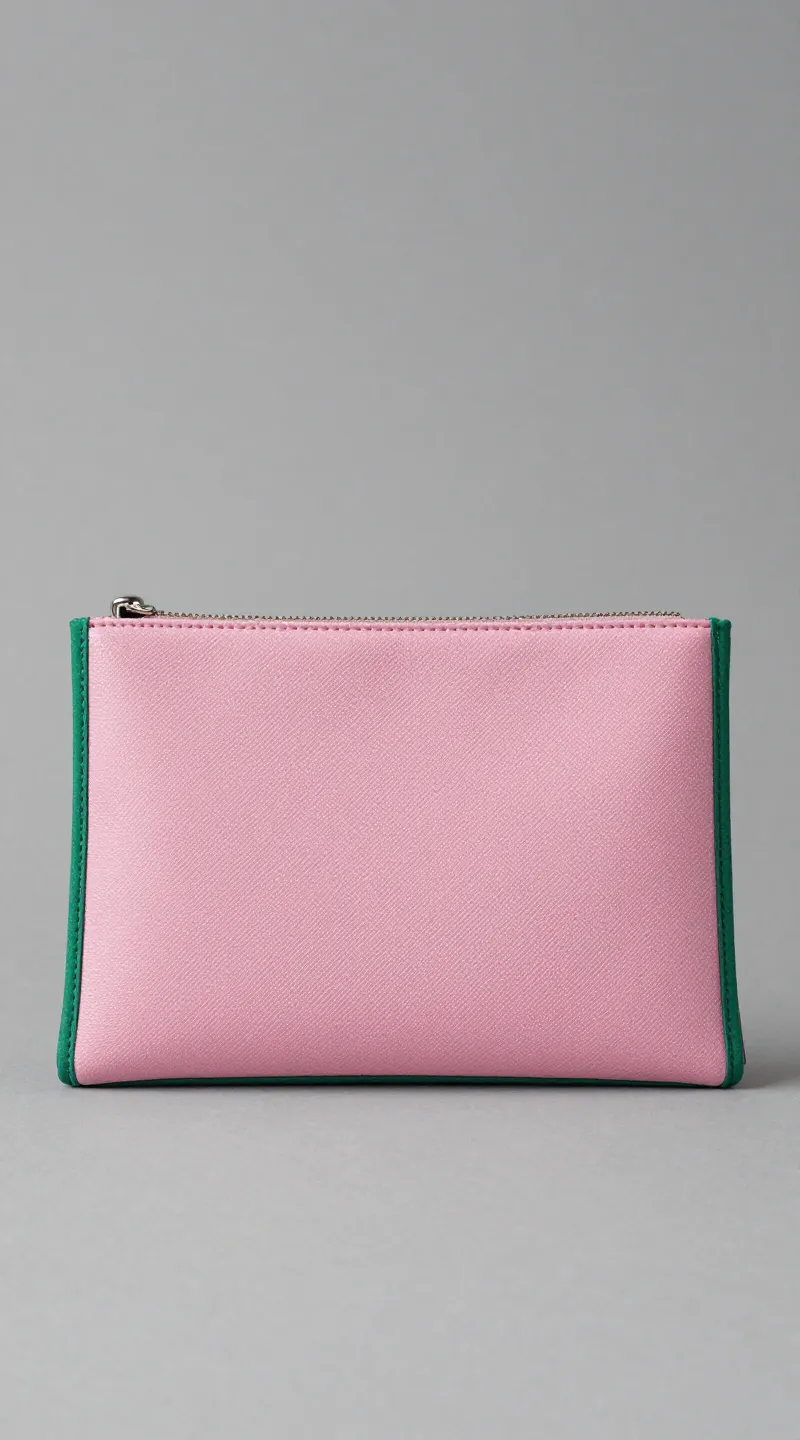**Single Pepto-Bismol pink clutch with emerald trim**
