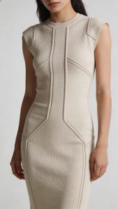 **Single stretchy knit dress with structured seams on a model**