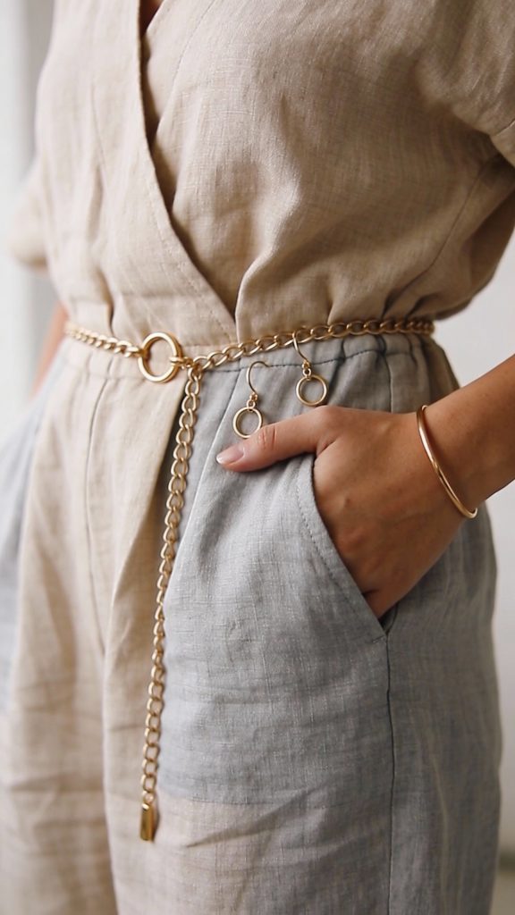 **Closeup of a chic linen jumpsuit with gold accessories** Each prompt focuses on one key item mentioned in the article, avoids complex scenes, and aligns with professional photography standards.