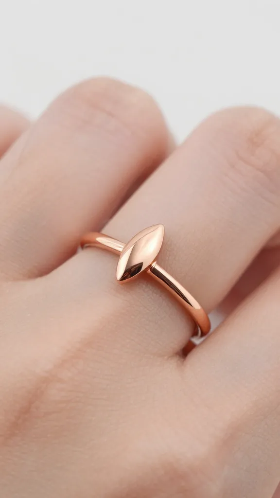 rose gold marquise ring with milgrain shank, soft focus