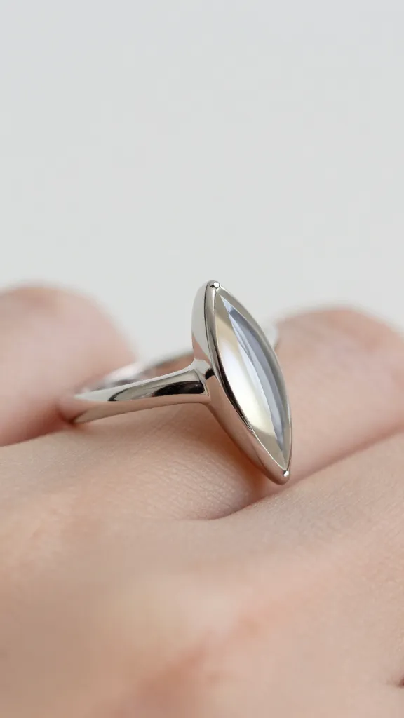 tilted marquise ring with curved contour band macro