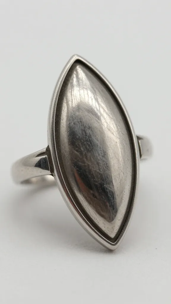 vintage marquise ring closeup, milgrain detail, platinum setting